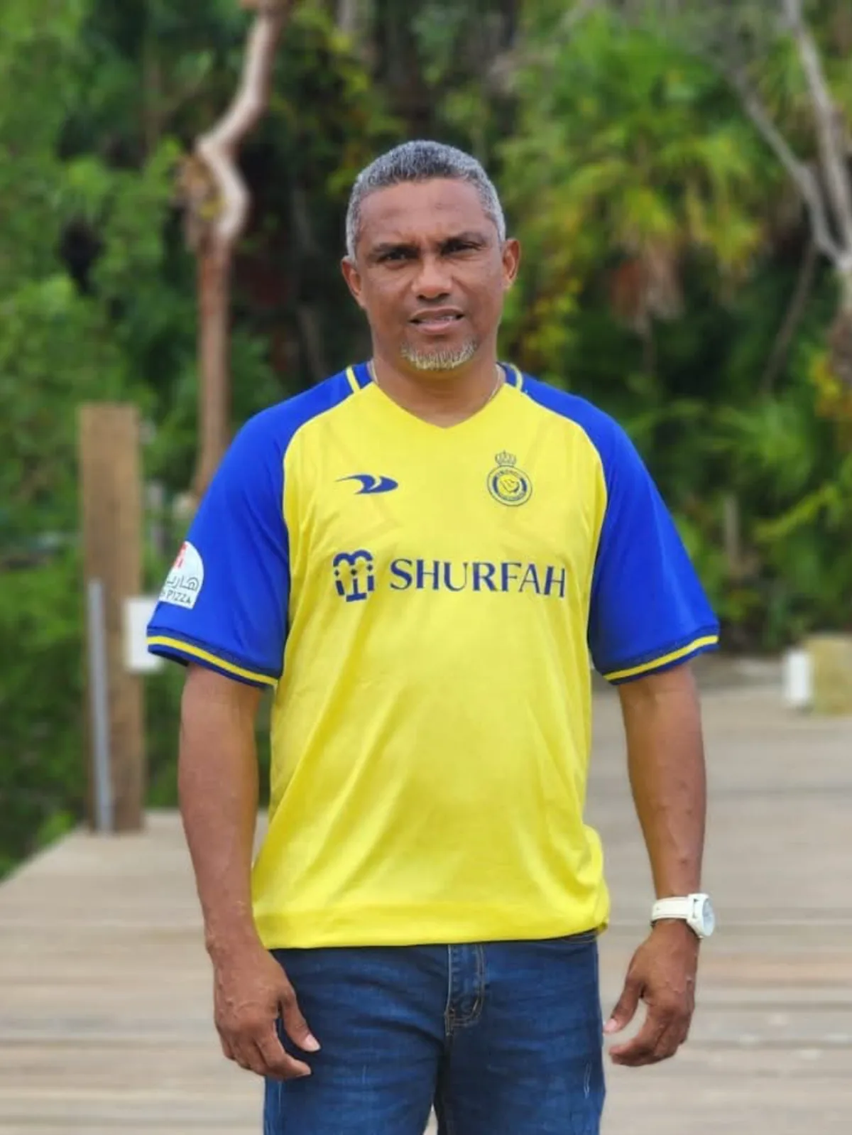 Carlos Connor "Toñin" of Roatan Caracol Tours on a wooden walkway in Roatán